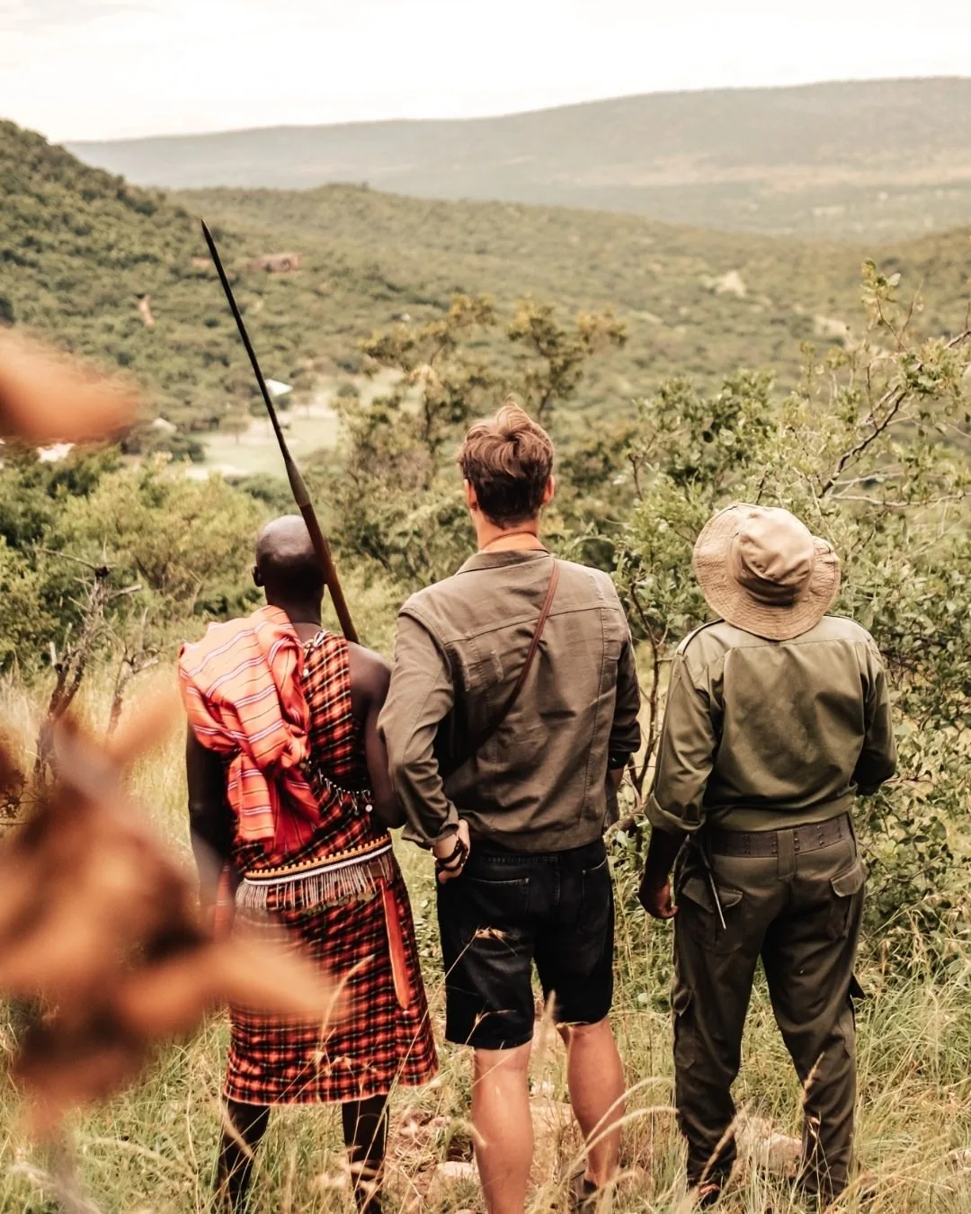 Sundowner moment overlooking the African plains
